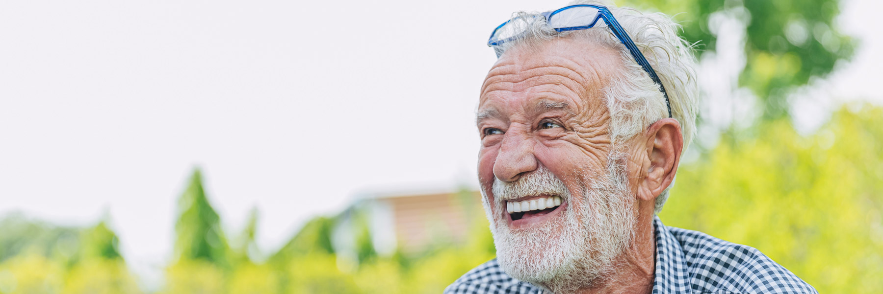 Man smiling with dentures from dentist in Idaho Falls, Dr. Michael Elison.