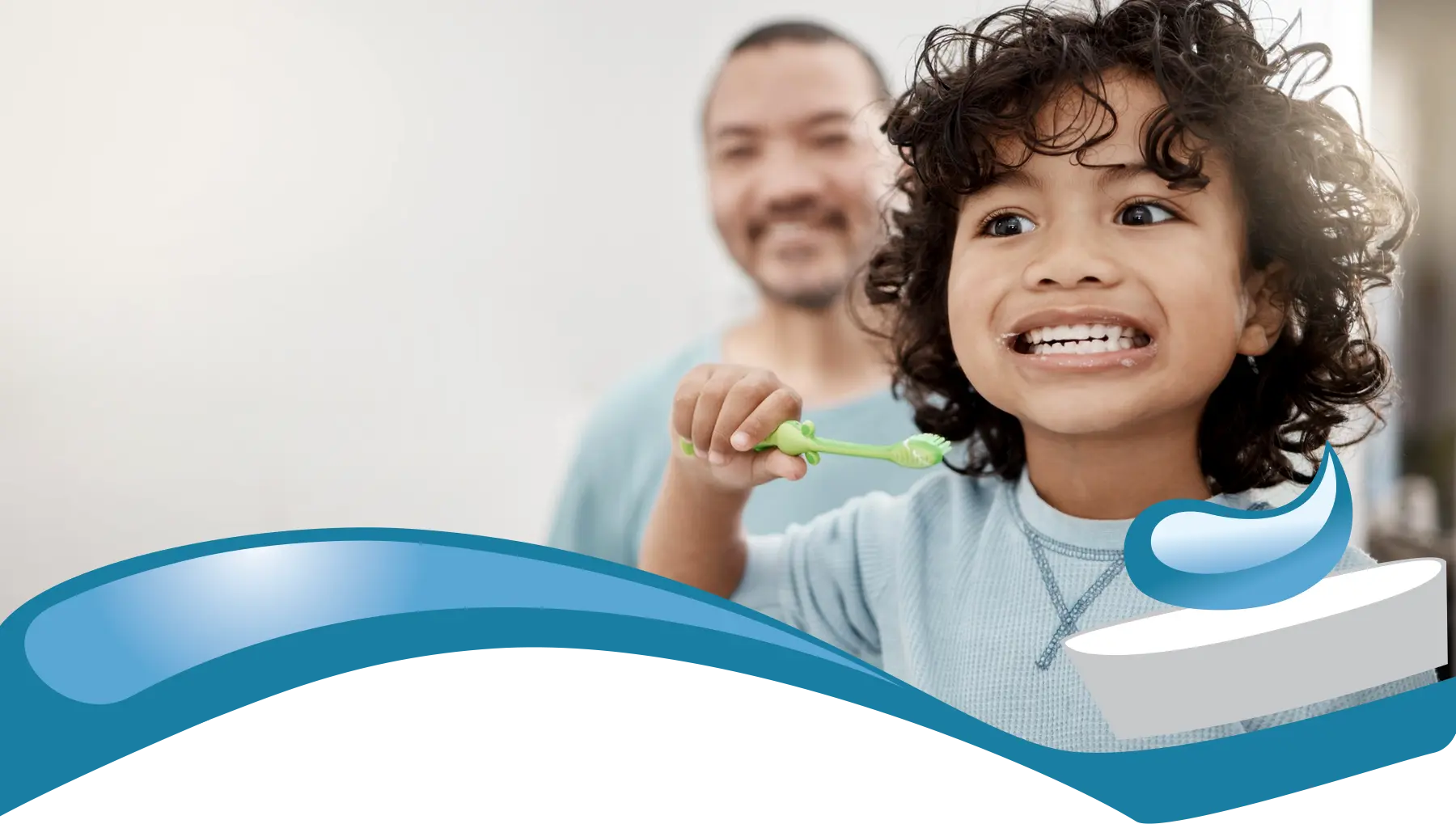 Dentist in Idaho Falls looking at young child brushing teeth.